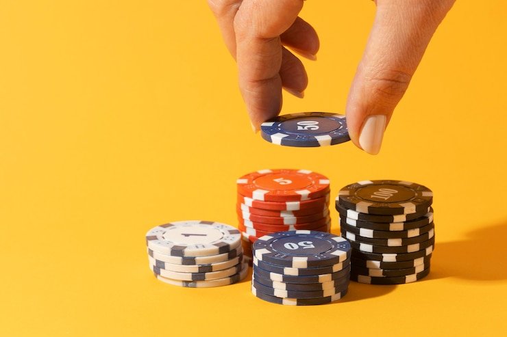 Live dealer baccarat table on mobile phone showing cards and betting interface